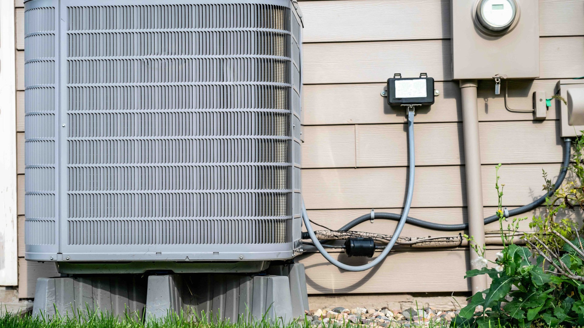 Modern smart thermostat installed in Florida home