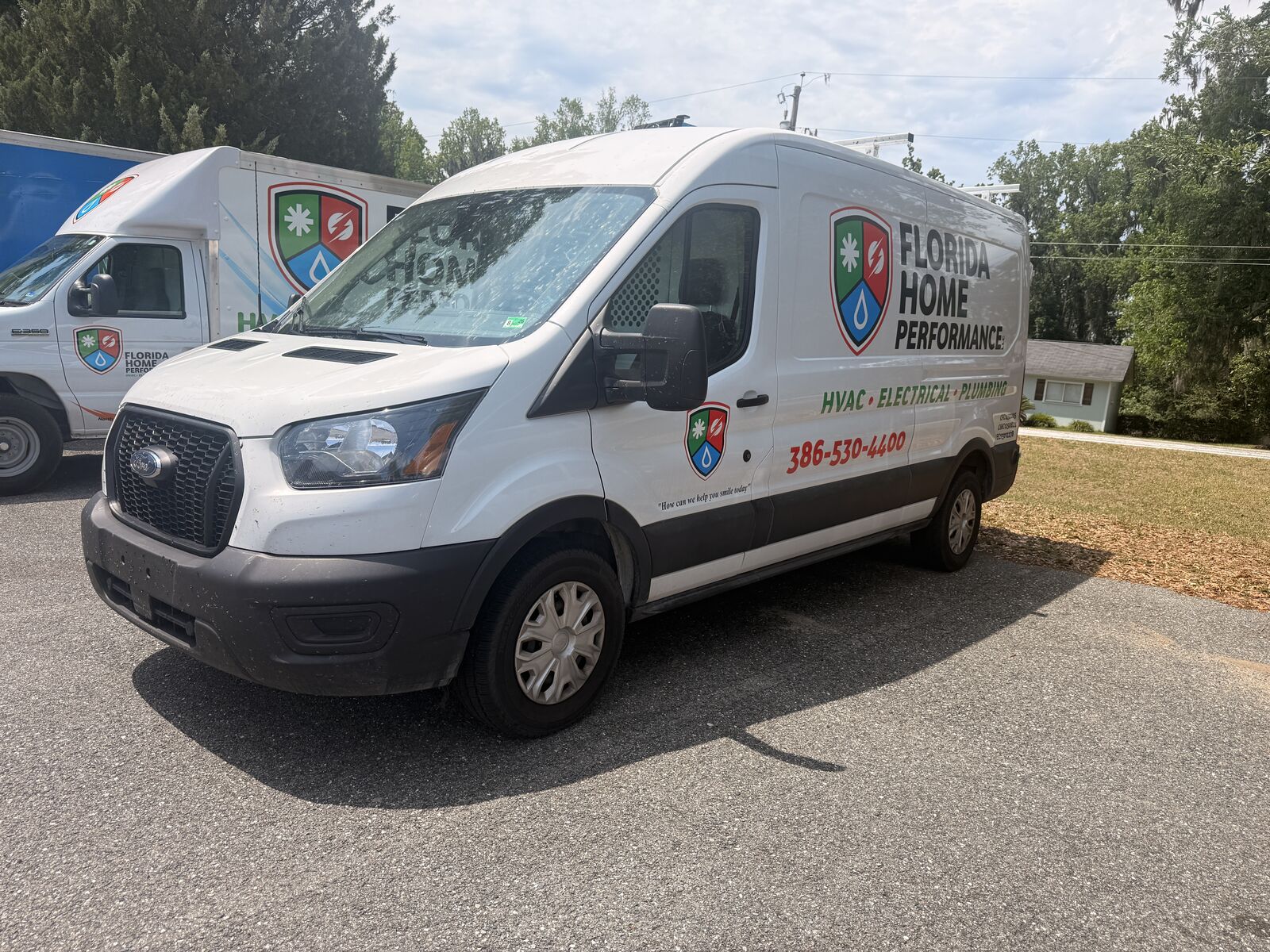 Florida Home Performance fleet of branded service vans